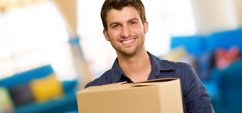 Man Carrying a Box to his Storage Locker