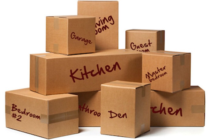 Self-Storage Items Organized in Packing Boxes